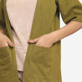 Front Detail of a Model wearing Reversible Cotton Flax Front Open Overlay