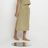 Right View of a Model wearing Khaki Green Vegetable Dyed Button-Down Skirt