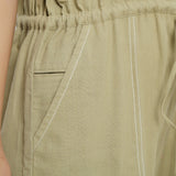 Right Detail of a Model wearing Vegetable Dyed Button-Down Jumpsuit