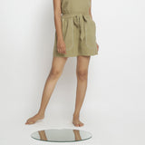 Front View of a Model wearing Khaki Green Vegetable Dyed Cotton Elasticated Short Shorts
