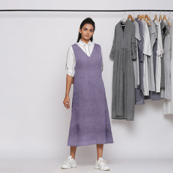Front View of a Model wearing Lavender 100% Linen V-Neck Midi Pinafore Dress