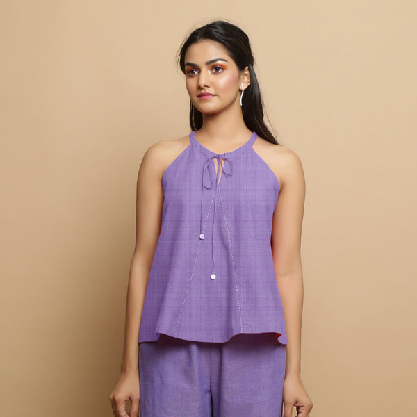 Front View of a Model wearing Lavender Hand-Embroidered Flared Top