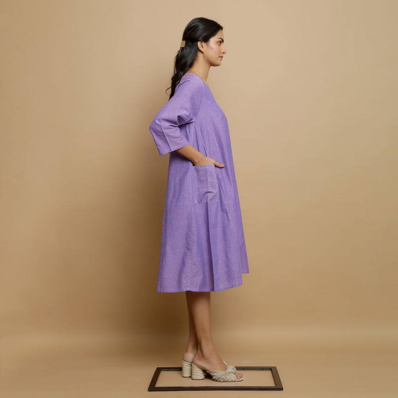 Right View of a Model wearing Lavender Hand-Embroidered Godet Dress
