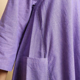 Front Detail of a Model wearing Lavender Hand-Embroidered Godet Dress