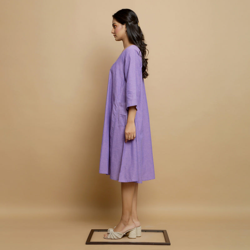 Left View of a Model wearing Lavender Hand-Embroidered Godet Dress