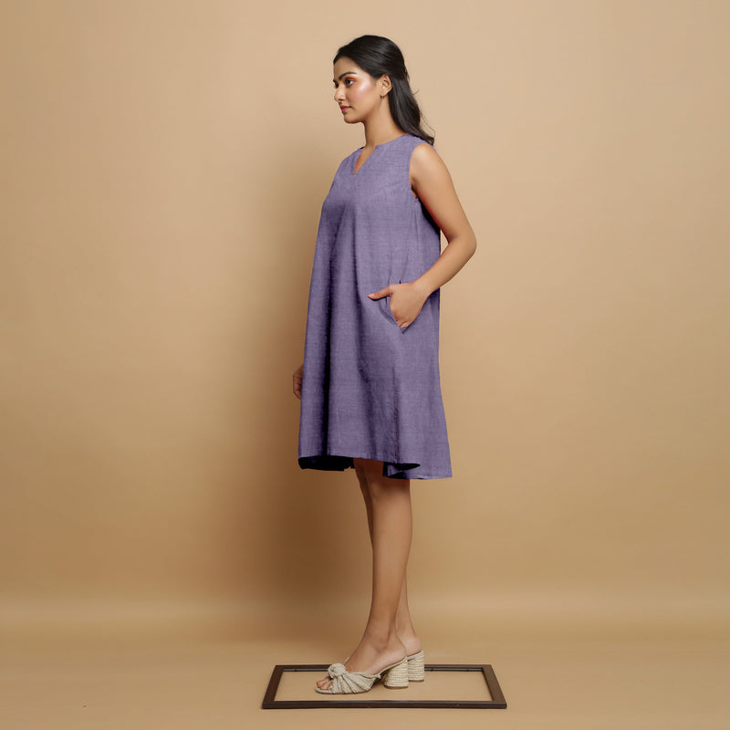 Left View of a Model wearing Lavender Linen Embroidered Knee-Length Godet Dress