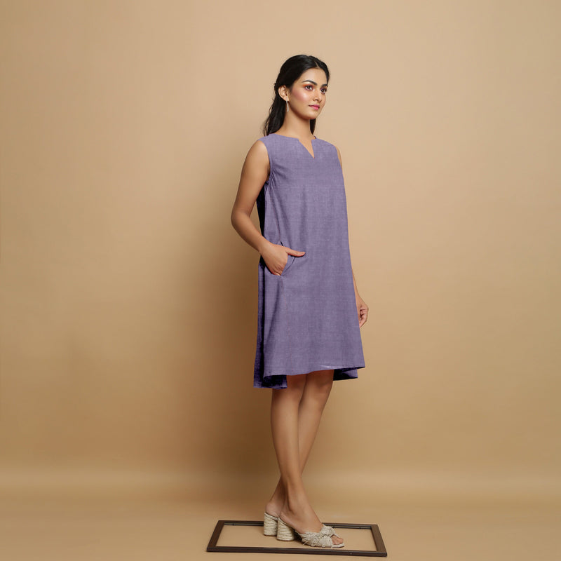 Right View of a Model wearing Lavender Linen Embroidered Knee-Length Godet Dress