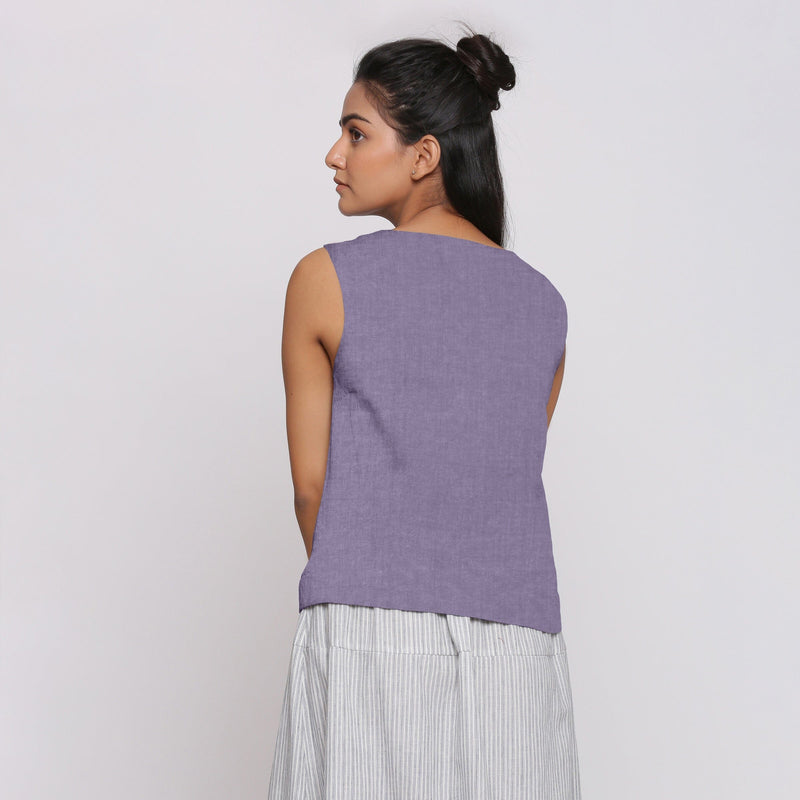 Back View of a Model wearing Lavender Linen Split Neck Button-Down Sleeveless Top