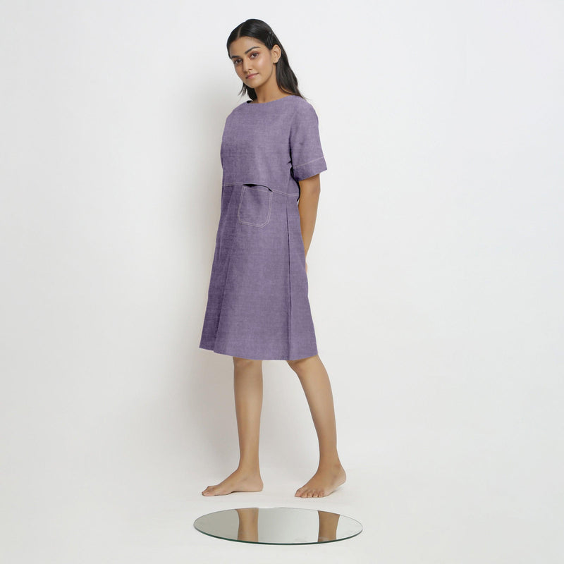 Left View of a Model wearing Lavender 100% Linen Knee Length Yoked Dress
