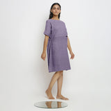 Right View of a Model wearing Lavender 100% Linen Knee Length Yoked Dress