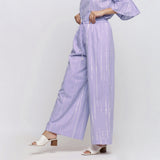 Left View of a Model wearing Lavender Hand Tie Dye Cotton Elasticated Wide Legged Pant