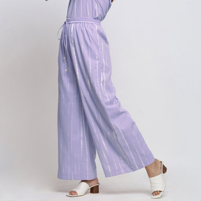 Left View of a Model wearing Lavender Tie Dye Wide Legged Palazzo Pant