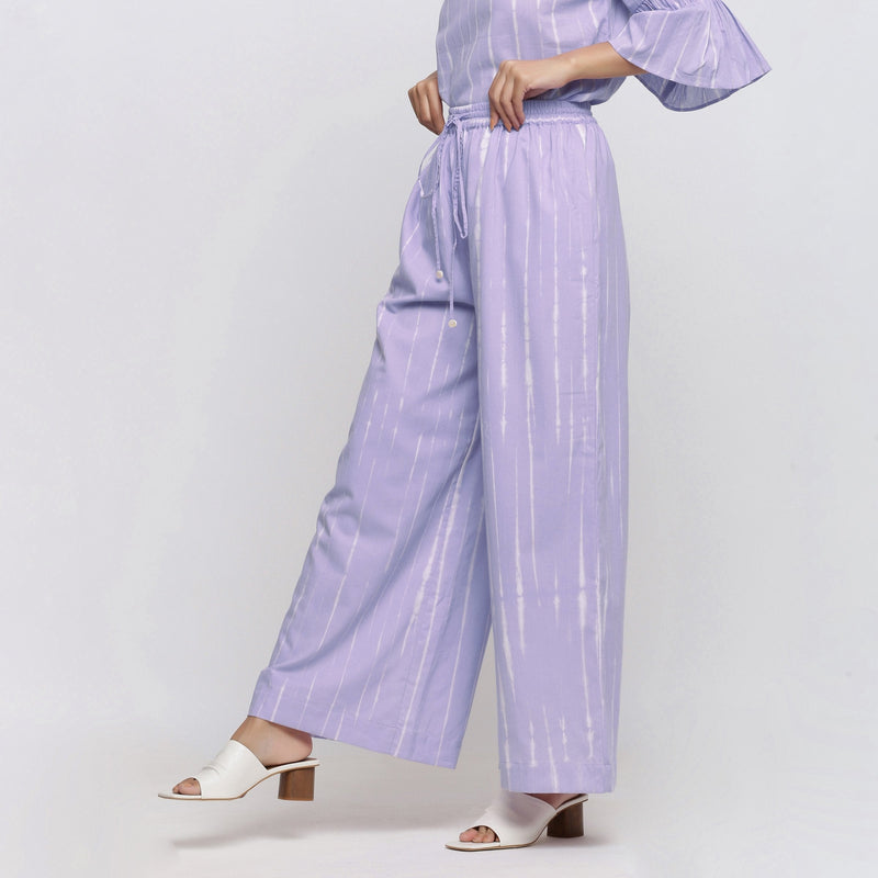 Left View of a Model wearing Lavender Tie Dye Wide Legged Palazzo Pant