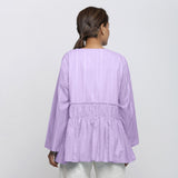Back View of a Model wearing Lavender Tie Dyed Anti-Fit Outerwear