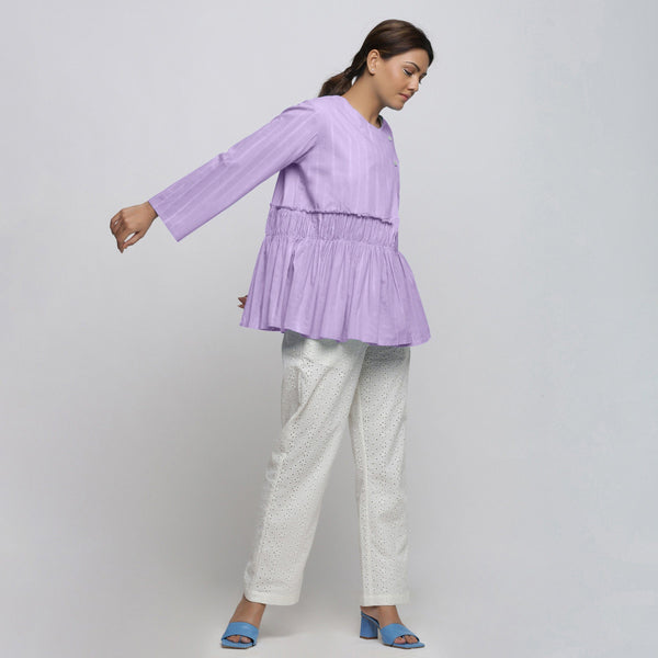 Right View of a Model wearing Lavender Tie Dyed Anti-Fit Outerwear