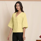 Left View of a Model wearing Lemon Yellow Comfy Straight Top