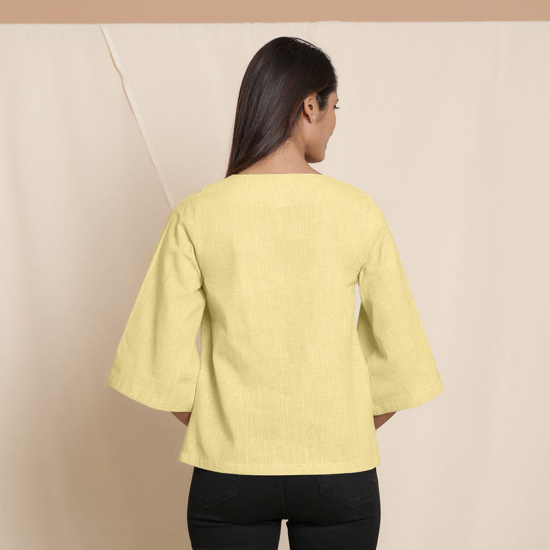 Back View of a Model wearing Lemon Yellow Comfy Straight Top