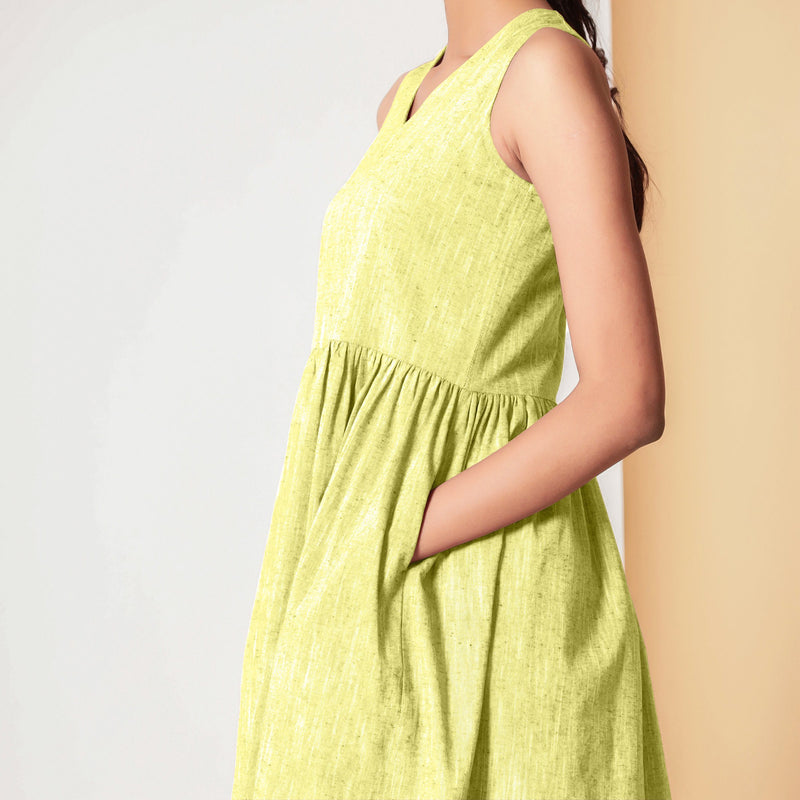 Left Detail of a Model wearing Lemon Yellow Gathered Yoke Dress