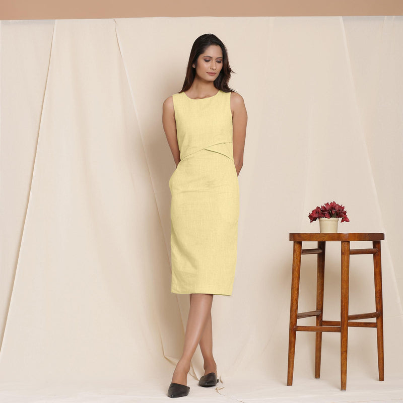 Front View of a Model wearing Lemon Yellow Knee Length Cotton Sheath Dress
