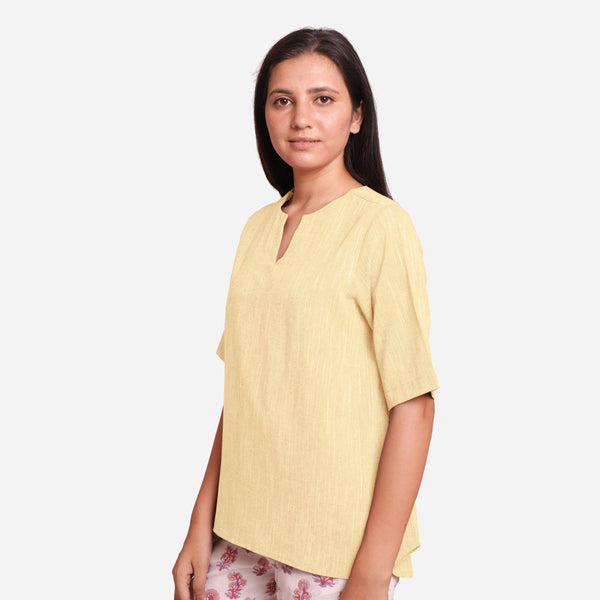 Left View of a Model wearing Lemon Yellow Yarn Dyed Cotton High-Low Top