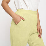 Front Detail of a Model wearing Lemon Yellow Yarn Dyed Mid Rise Tapered Pant