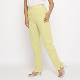 Left View of a Model wearing Lemon Yellow Yarn Dyed Mid Rise Tapered Pant