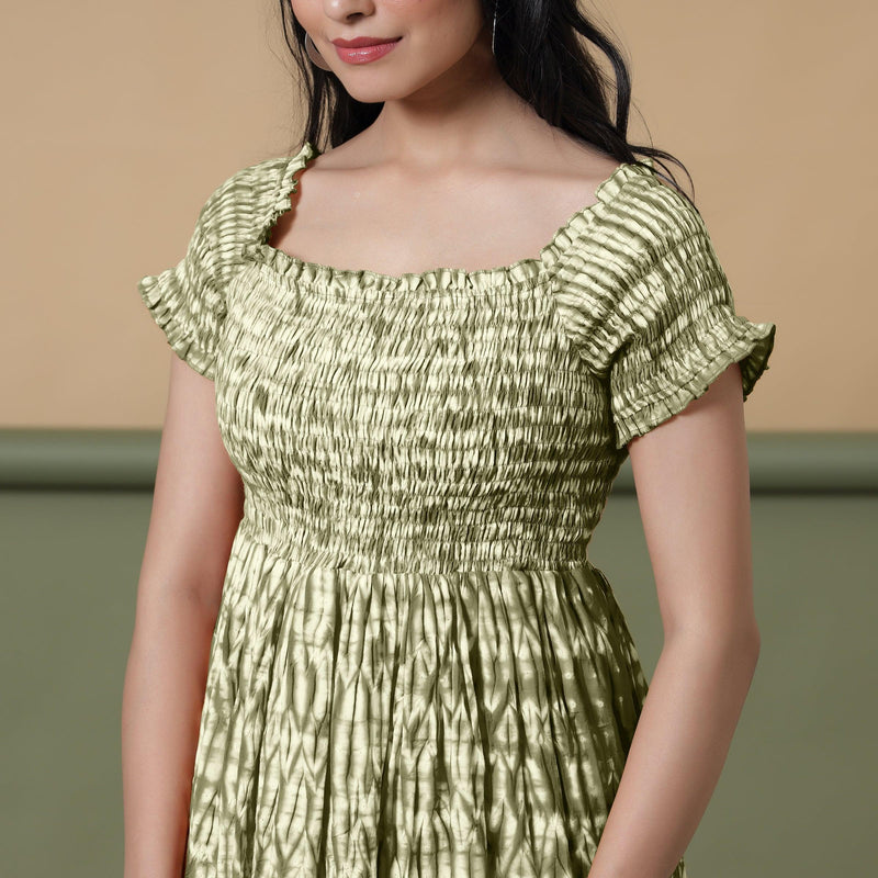 Front Detail of a Model wearing Light Green Shibori Elasticated Gathered Dress