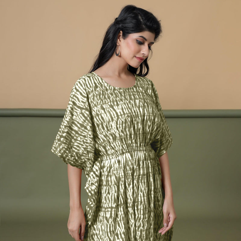 Right View of a Model wearing Light Green Shibori Kaftan Dress