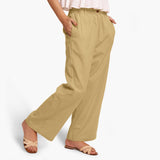 Right View of a Model wearing Light Khakhi Cotton Flax Wide Legged Straight Pant