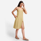 Right View of a Model wearing Light Khaki Cotton Flax Strappy Slit Dress