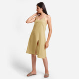 Left View of a Model wearing Light Khaki Cotton Flax Strappy Slit Dress