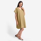 Right View of a Model wearing Light Khaki Cotton Flax V-Neck Tunic