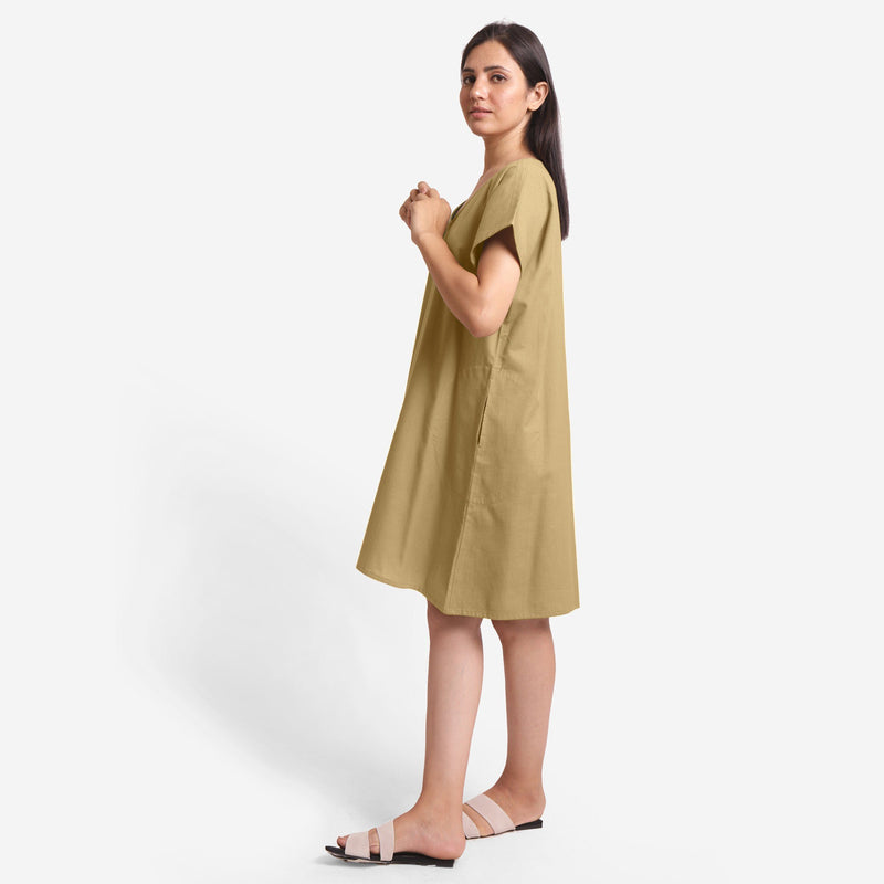 Left View of a Model wearing Light Khaki Cotton Flax V-Neck Tunic