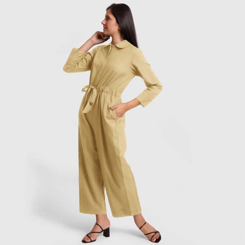 Left View of a Model wearing Light Khaki Wide Legged Cotton Overall