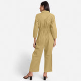 Back View of a Model wearing Light Khaki Wide Legged Cotton Overall