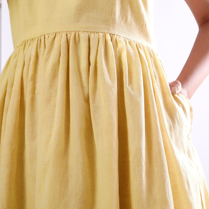 Front Detail of a Model wearing Light Yellow Handspun Camisole Dress