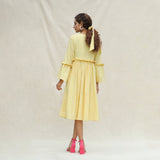 Back View of a Model wearing Light Yellow Handspun Cotton Bohemian Midi Dress