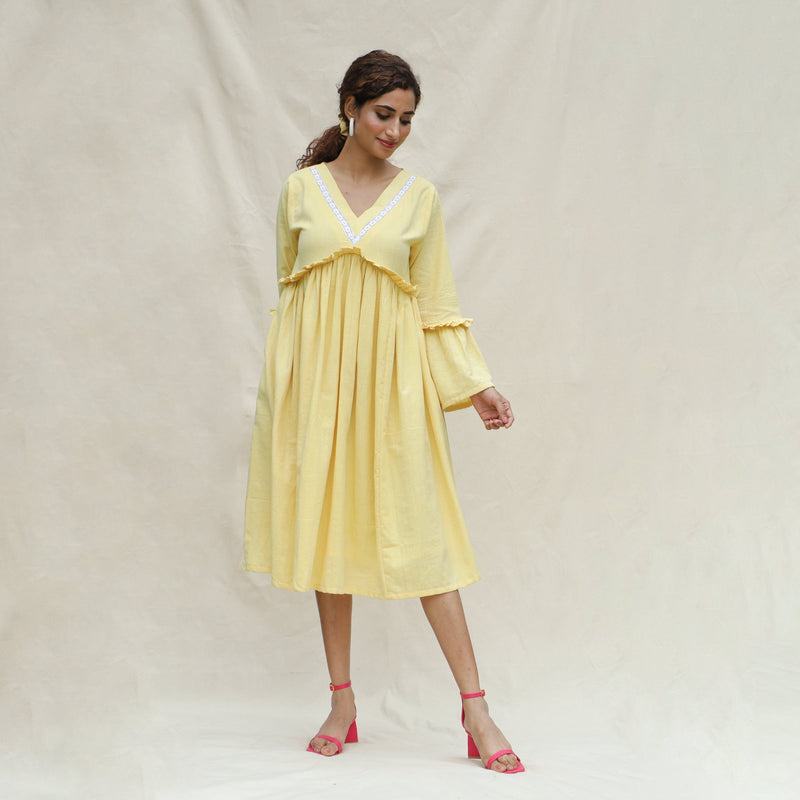 Front View of a Model wearing Light Yellow Handspun Cotton Bohemian Midi Dress