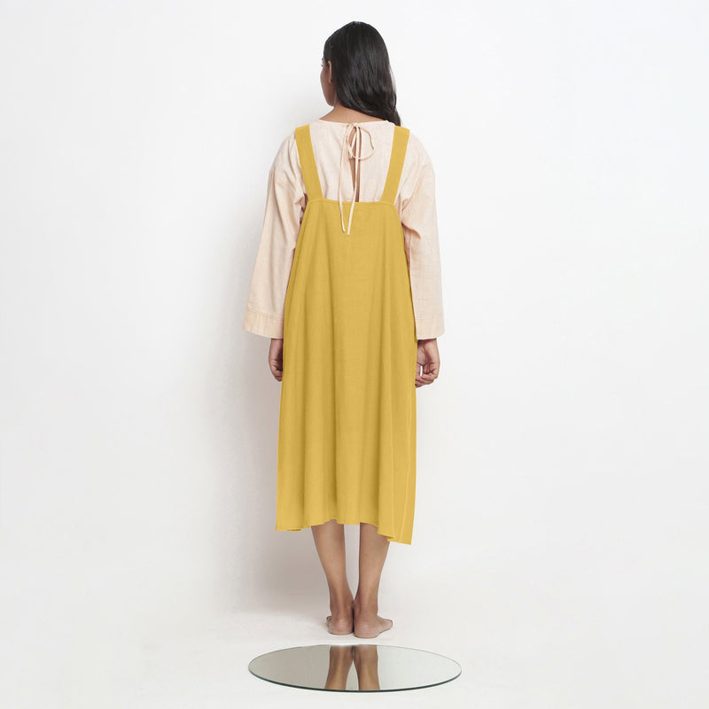 Back View of a Model wearing Light Yellow Handspun Cotton Deep Neck Shift Dress