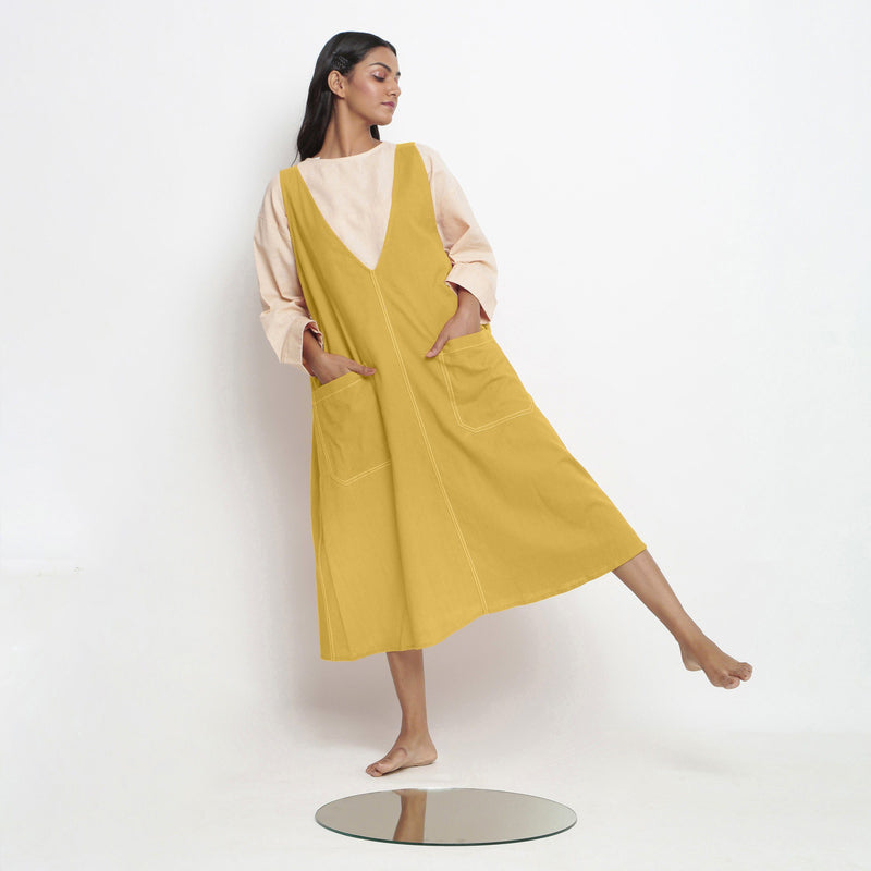 Front View of a Model wearing Light Yellow Handspun Cotton Deep Neck Shift Dress