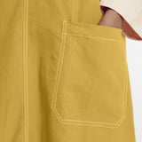 Close View of a Model wearing Light Yellow Handspun Cotton Deep Neck Shift Dress