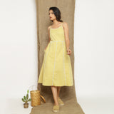Front View of a Model wearing Light Yellow Handspun Cotton Lace Camisole Dress