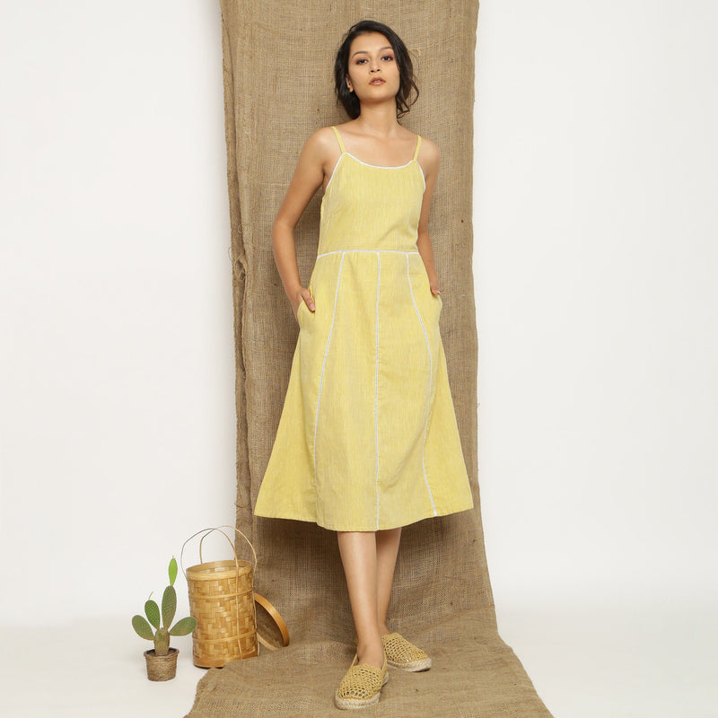 Front View of a Model wearing Light Yellow Handspun Cotton Lace Camisole Dress