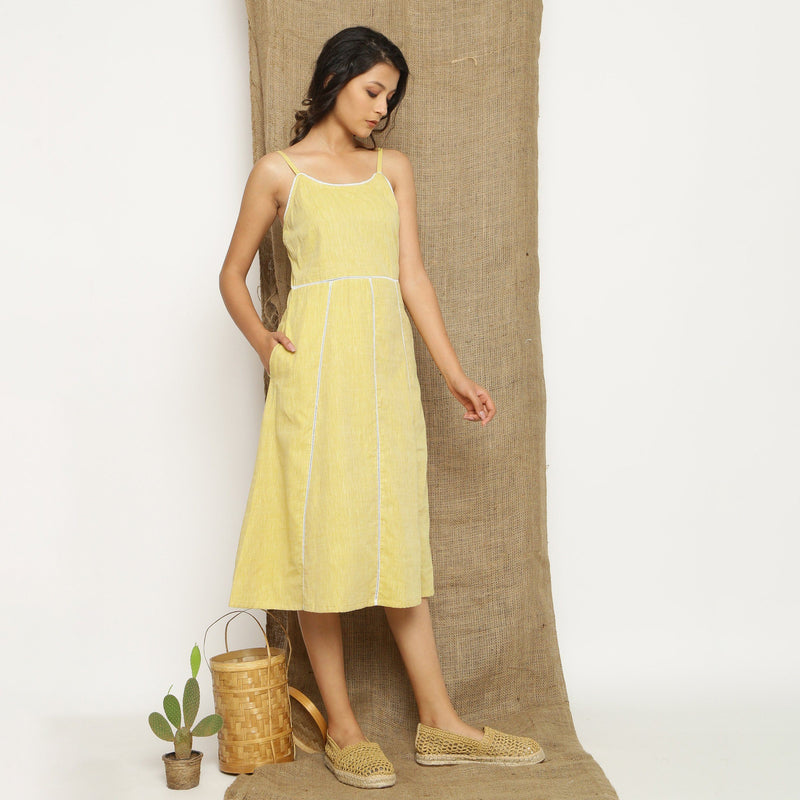 Right View of a Model wearing Light Yellow Handspun Cotton Lace Camisole Dress