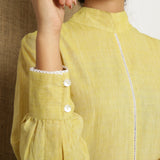 Front Detail of a Model wearing Light Yellow Handspun Halter Neck Top