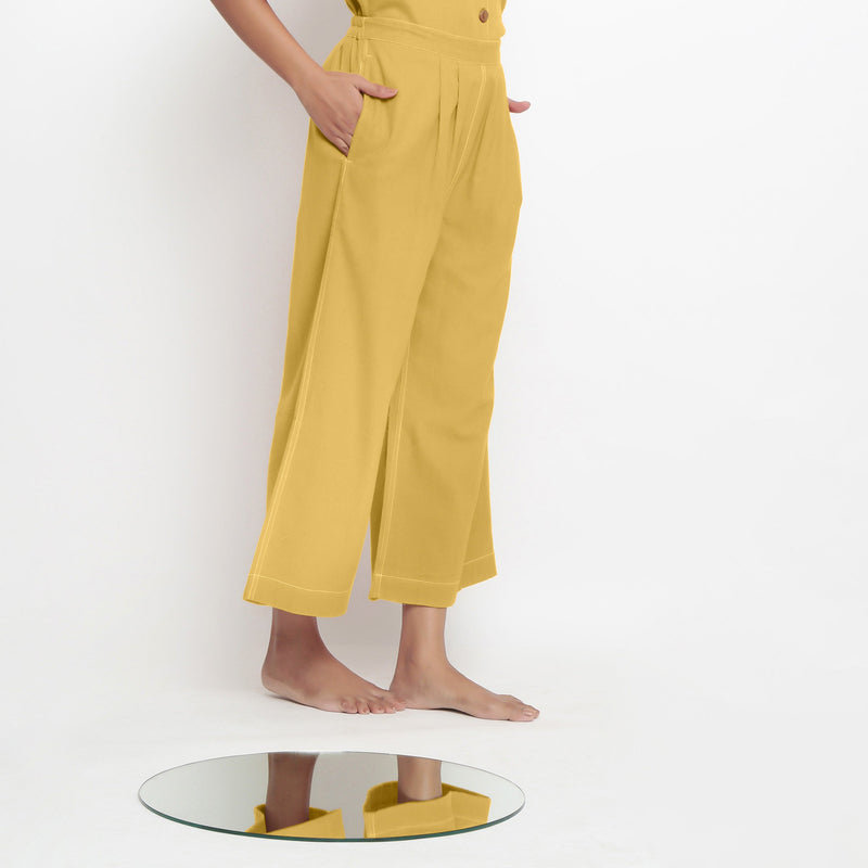 Right View of a Model wearing Light Yellow Vegetable Dyed Wide Legged Pant