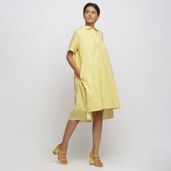 Right View of a Model wearing Light Yellow Tie And Dye High Low Dress