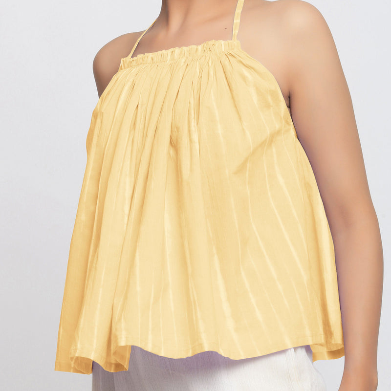 Front Detail View of a Model wearing Light Yellow Tie Dye Strappy Camisole Top