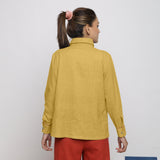 Back View of a Model wearing Light Yellow Vegetable Dyed 100% Cotton Button-Down Shirt