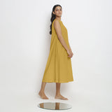 Right View of a Model wearing Light Yellow Vegetable Dyed A-Line Paneled Dress